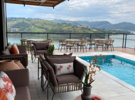 Vista do Lago Hotel，位于卡皮托利乌的带按摩浴缸的酒店