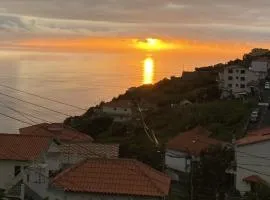 Cozy 1 BR w/ balcony, ocean view & perfect sunsets