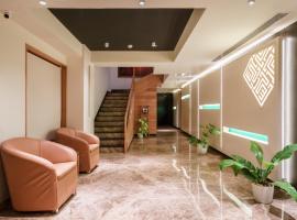 Townbridge Hotels & Suites，位于科钦拉吉夫甘地室内体育场附近的酒店