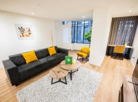 Great 95m² Two-Bedroom Apartment，位于蒂尔的酒店