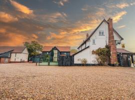 小客栈酒店，位于Yaxley的酒店