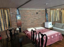 Loft casa dos pisos con garage pocitos playa 4 personas，位于蒙得维的亚的酒店