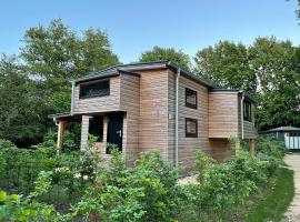 Tiny House am Veluwemeer im Europarcs Bad Hoophuizen，位于许尔斯霍斯特的小屋