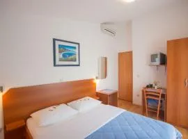 Rooms in Novalja with balcony, air conditioning, WiFi 3764-8