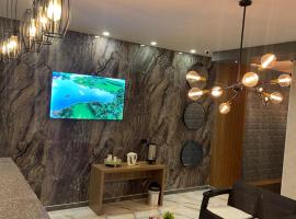 WH HOTEL，位于圣安德烈斯的酒店