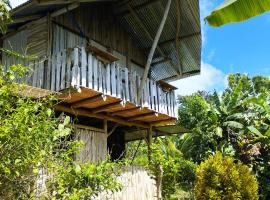 La Muñequita Lodge 1 - culture & nature experience，位于Palmar Norte的木屋