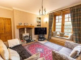 STATION COTTAGE - Unique Accommodation with River Flowing through Garden