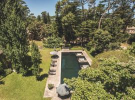 Be House Suites & Spa，位于埃斯特角城的带泳池的酒店