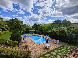 Chalés de Minas Hotel Fazenda，位于卡尚布的酒店