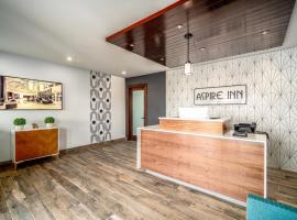 Aspire Inn Studios & Spas，位于贝尔弗劳尔的酒店