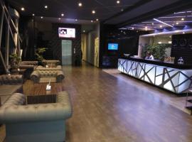 West Inn Hotel Faisalabad，位于费萨拉巴德的酒店