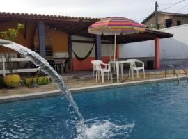 Diversão, churrasco e piscina - Praia de Ipitanga，位于萨尔瓦多的度假屋
