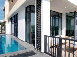 Beach Villas by Olala Homes，位于拉斯阿尔卡麦的酒店