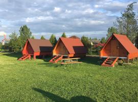 SZAŁASY drewniane nad rzeką BIEBRZA，位于戈尼翁兹的豪华帐篷营地