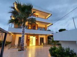 FINIKAS Suites & Apartments 10min from Athens Airport，位于阿特米达的海滩短租房