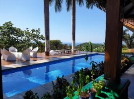 Palmetto Lodge，位于Playa San Miguel 的住宿加早餐旅馆
