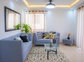 Luxury, cozy apartment Alma Rosa /15 min airport，位于Los Tres Ojos de Agua的带停车场的酒店