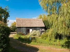 Deepwell Granary is a lovely thatched barn with attached meadow woodland