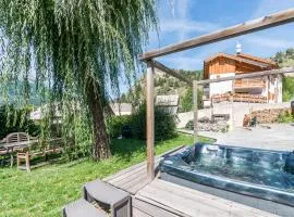 Luxury Chalet with outdoor Hot Tub, Sauna, Gardens & Mountain Views!