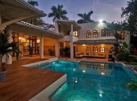Oceana - Beachfront Villa，位于马尔帕伊斯的海滩短租房