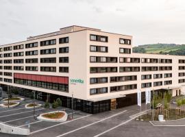 Senevita Dorfmatt Ferienwohnungen und Apartments，位于明辛根的酒店