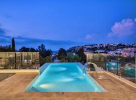 Maltese Luxury Villas - Sunset Infinity Pools, Indoor Heated Pools and More!，位于梅利哈的别墅