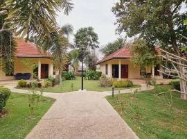 Beautiful bungalow with shared outdoor pool and 2 km from the sandy beach