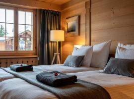 Charming Alpine Apartment Gstaad，位于格施塔德的酒店