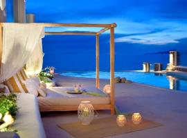 5 bedrooms villa with sea view private pool and enclosed garden at Mykonos，位于圣爱奥尼斯米科诺斯的酒店