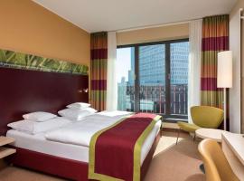 Mövenpick Hotel Frankfurt City Messe，位于美因河畔法兰克福加鲁斯维亚特尔的酒店