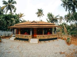 Mundro Garden Homestay，位于Munroe Island阿什塔木迪湖附近的酒店