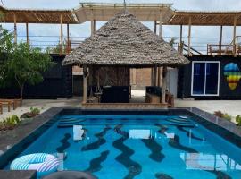 Jambiani Backpackers Hostel，位于江比阿的带泳池的酒店