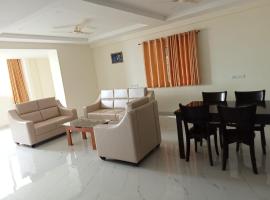 Sathya Sai Sankalp Hotel，位于普塔帕蒂的酒店