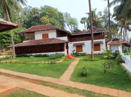Kalappura Farm House Heritage，位于Ottappālam肖努尔火车联运站附近的酒店