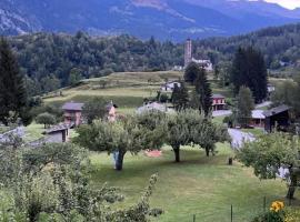 Casa Dorino - luogo idilliaco, ideale per famiglie, terrazza e ampio giardino fiorito, vista montagne，位于罗丁的木屋