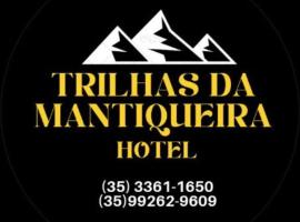 HotelTrilhasDaMantiqueira，位于伊塔年杜的酒店