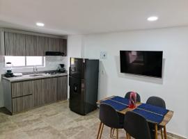 Aparta Estudio 2 Camas - Parqueadero para Moto - Ibagué - Ciprés，位于伊瓦格的酒店