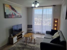 Departamento en Tome, Condominio Vista Bahia，位于托梅的酒店