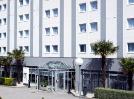 里昂欧埃斯特塔辛钟楼酒店，位于塔桑拉德米吕讷的酒店