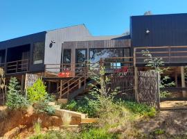 Cabañas Wildki Lodge Vichuquen，位于维丘肯的酒店