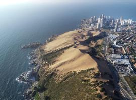 Exquisito Departamento Reñaca en el sector más turístico，位于维纳德马蒙特马尔公园附近的酒店