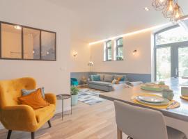 Superbe appartement 2 chambres dans un clos privé proche de Waterloo，位于Genappe的酒店