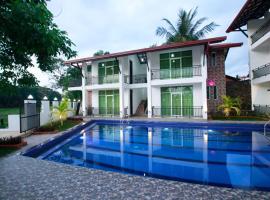 Hotel Sanri Villa Katunayake，位于Minuwangoda的酒店