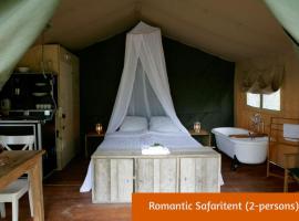 Safaritents & Glamping by Outdoors，位于霍尔滕的木屋