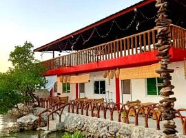 CASA BOLO IN ALAMINOS with HIDDEN WHITE BEACH near 100 Islands，位于阿拉米诺斯的酒店
