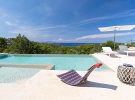 VILLA AMIRA Porto Cervo con vista Mozzafiato sul Mare,Piscina Privata,WELLNESS & SPA，位于利斯西亚迪维卡的酒店