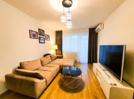 Luxurious Retreat 1BR Apartment with Netflix, Private Parking and self check in，位于Popeşti-Leordeni的酒店