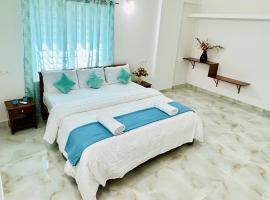 Tirupati Homestay - Shilparamam - Luxury AC apartments by Stayflexi - Fast WiFi, Kitchen, Android TV - Walk to PS4 Pure Veg Restaurant - Easy access to Airport, Railway Station and to all Temples，位于蒂鲁帕蒂的酒店