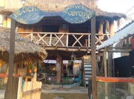 Kiosko uva playa frente al mar，位于San Onofre的木屋