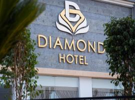Diamond Land Hotel，位于Madinat Al Ashir min RamadanAbū al Akhḑar附近的酒店